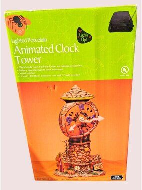 Lighted Porcelain Animated Clock Tower With Backward-Moving Hands Battery-Operat